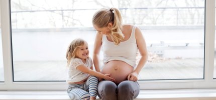 Schwangere und Kleinkind
